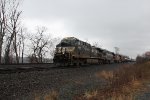 NS 4365 leads ethanol empties down the siding